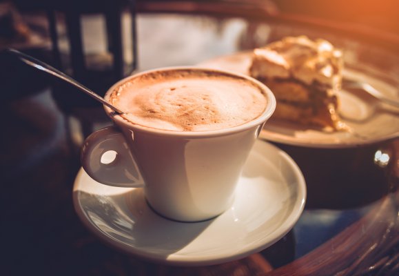 mounted coffee makers benefits best models brands cup of coffee with tsp in it cake on a plate in the background